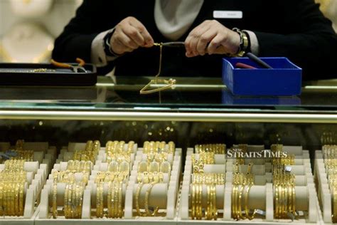 Gold prices set for second monthly gain; US inflation  .